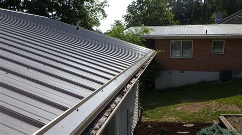 metal roof overhang into gutter